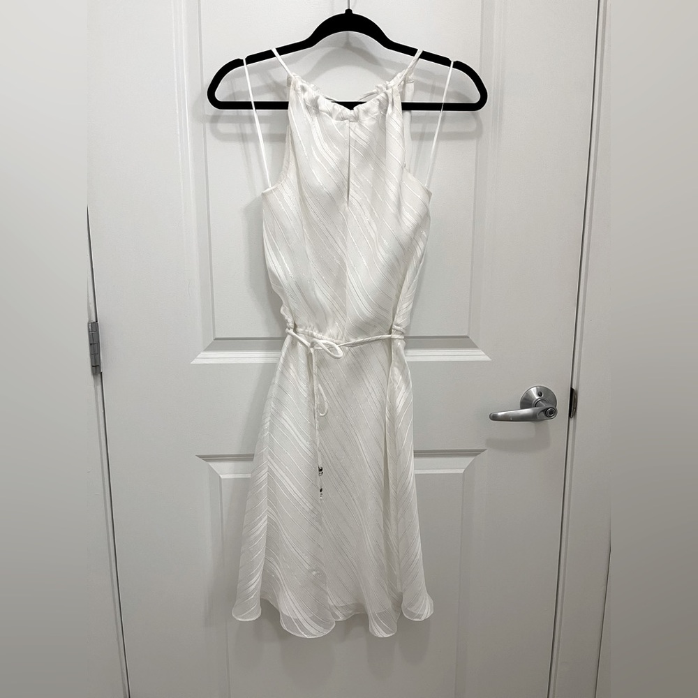 caché white high neck dress with silver thread and beading detail. size small